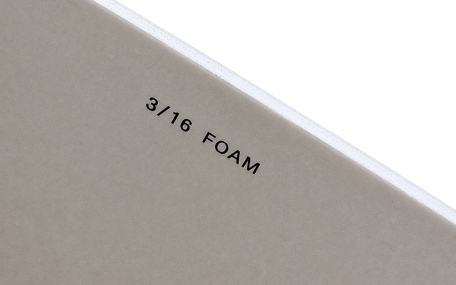 The cut corner of a board labelled 3/16 FOAM, showing its thickness