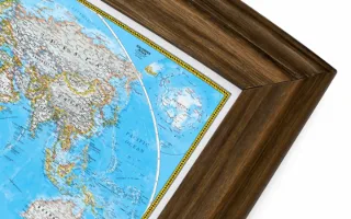 A map in an ornate gold-toned executive frame