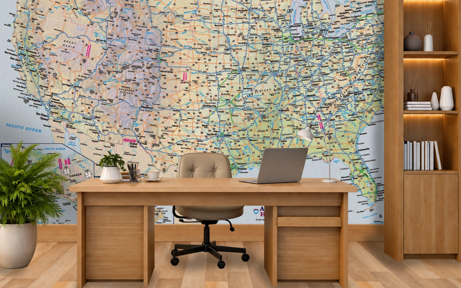 An office with a United States map wallpaper covering the wall behind a desk
